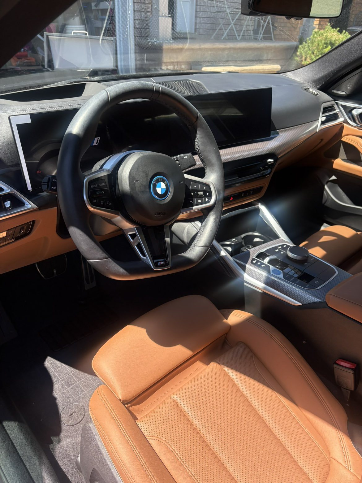 BMW i4 interior with cognac brown leather, freshly detailed
