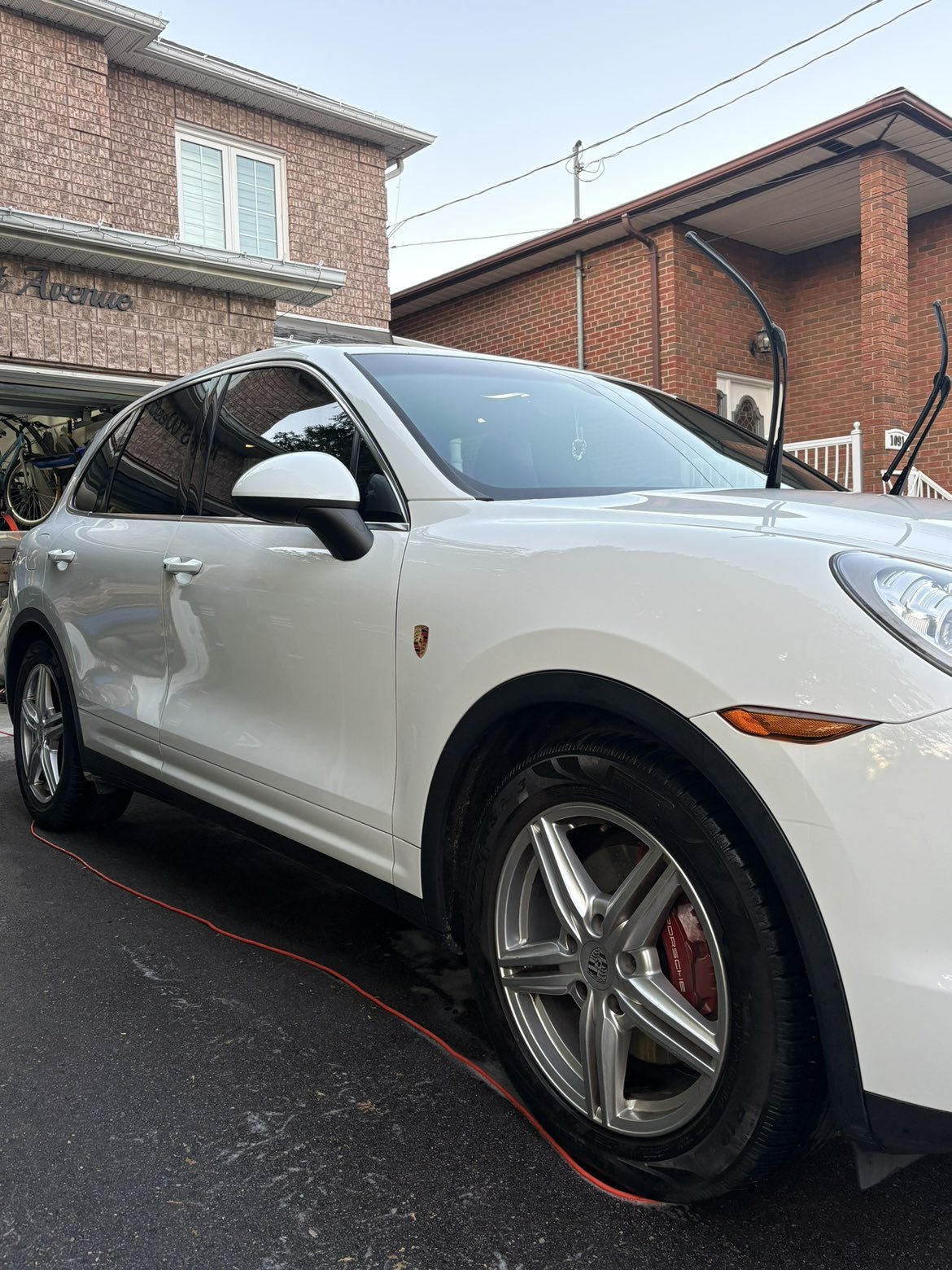 White Porsche Cayenne with a glossy ceramic finish