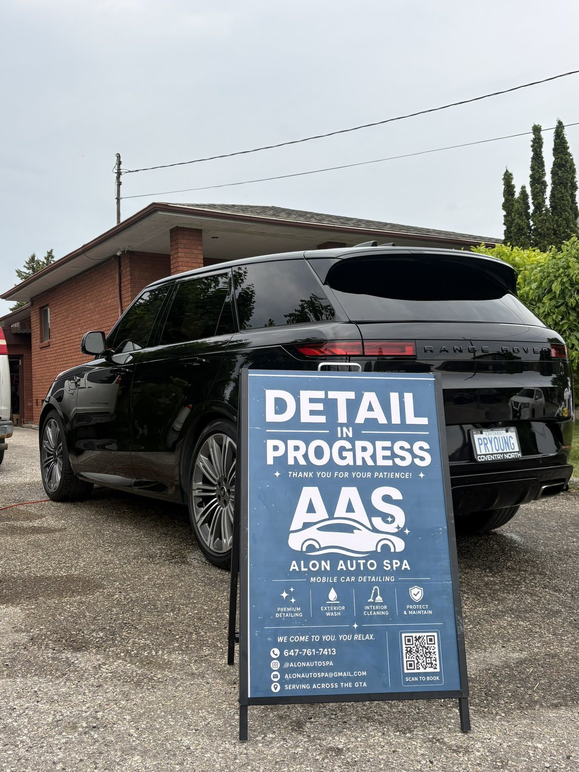 Detailing in progress on a black Range Rover