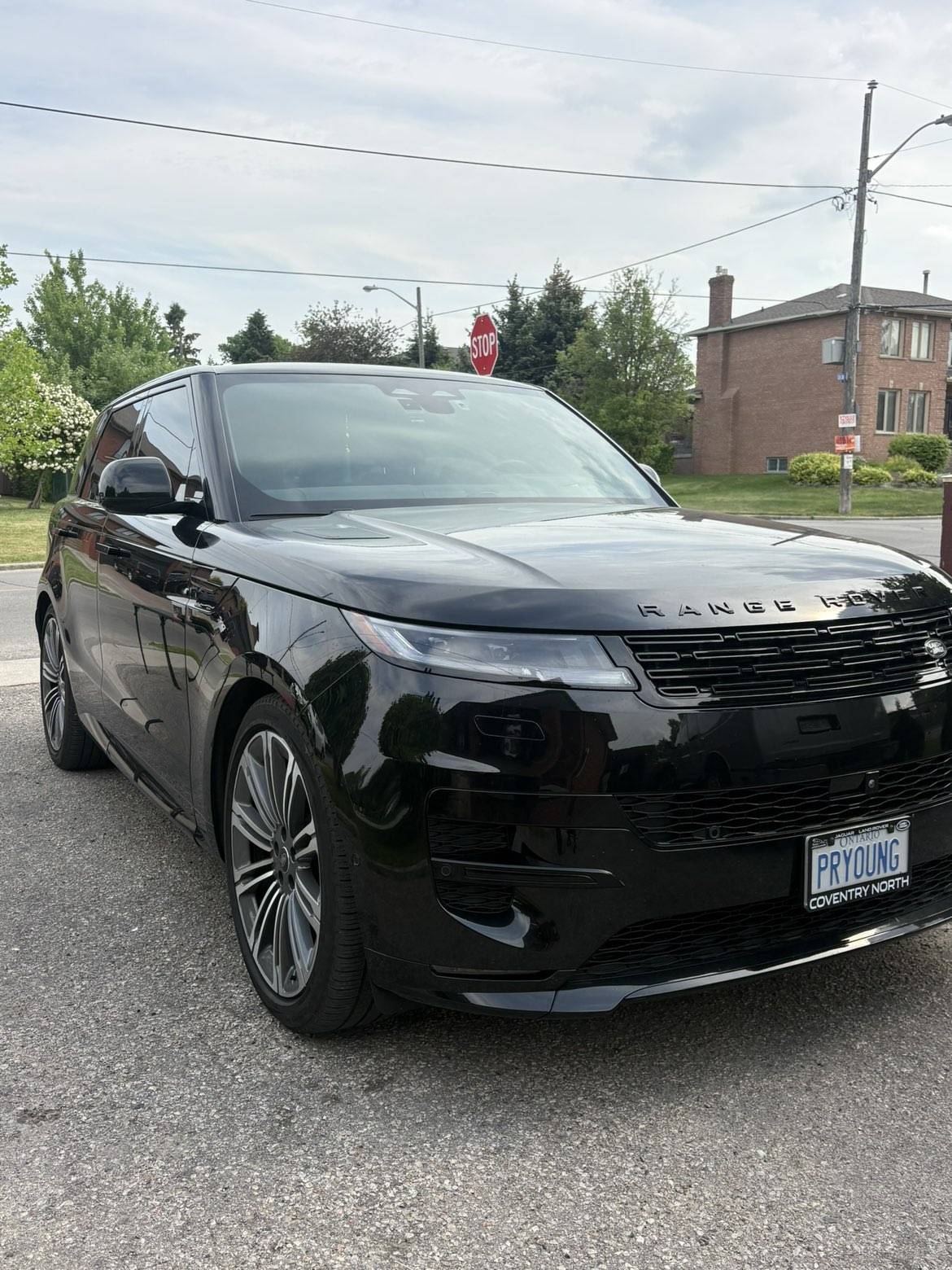 Black Range Rover Sport with a deep mirror-gloss ceramic finish