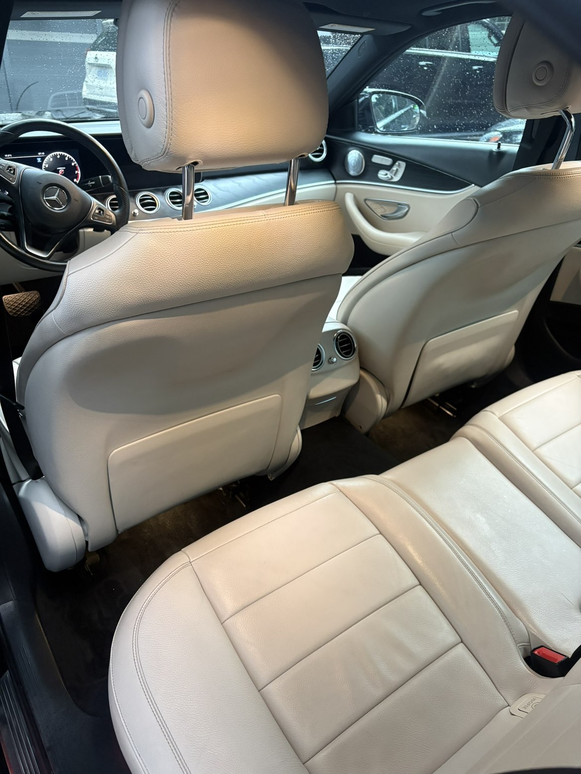Mercedes-Benz E-Class rear seats in cream leather, freshly cleaned