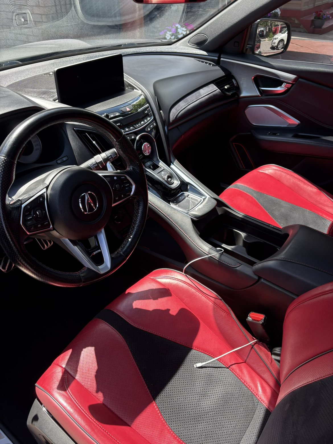 Acura RDX interior with red and black sport leather, detailed