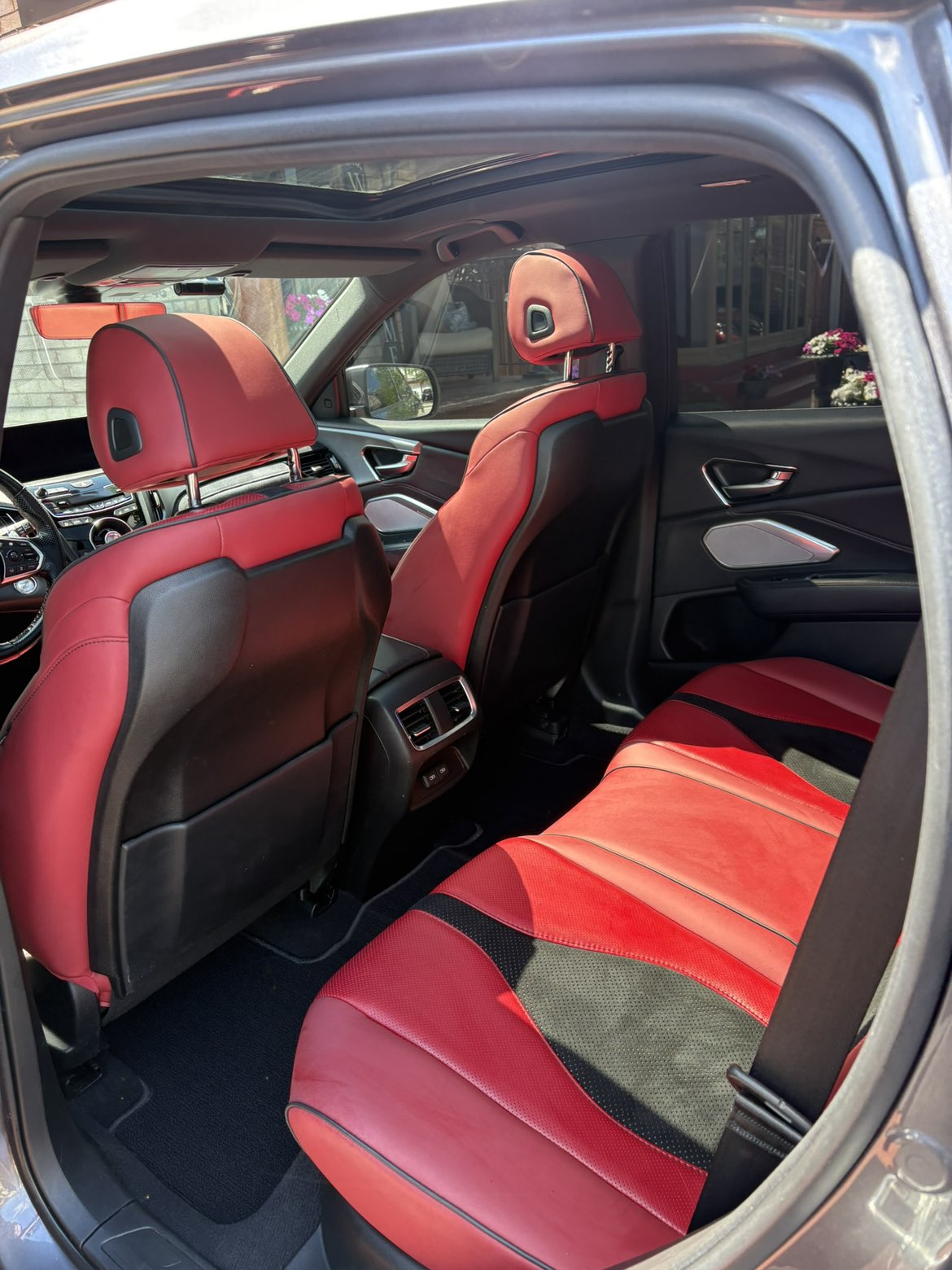 Acura RDX rear seats in red and black sport leather, detailed