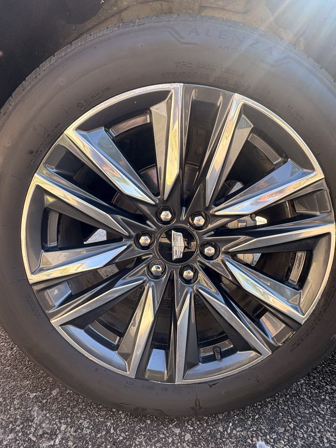 Cadillac Escalade polished wheel after detailing