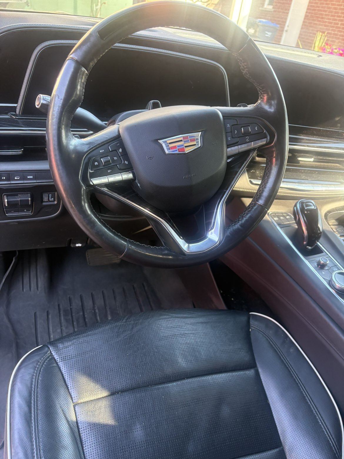 Cadillac Escalade interior with black leather, detailed cockpit